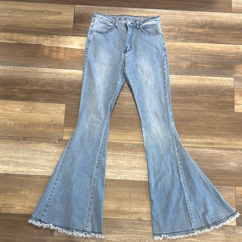 Blue Flare Wide Leg Jeans with Distressed Hem